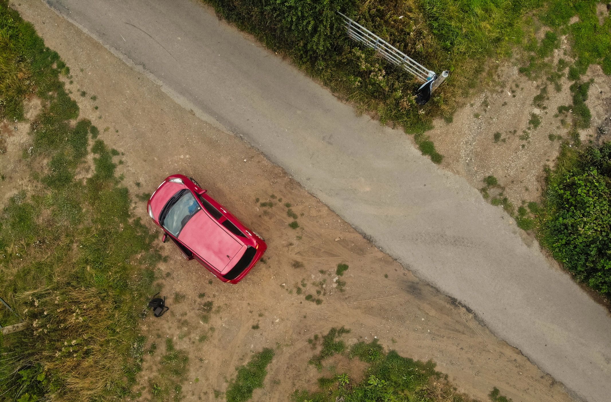 Older vehicle parked in a remote area