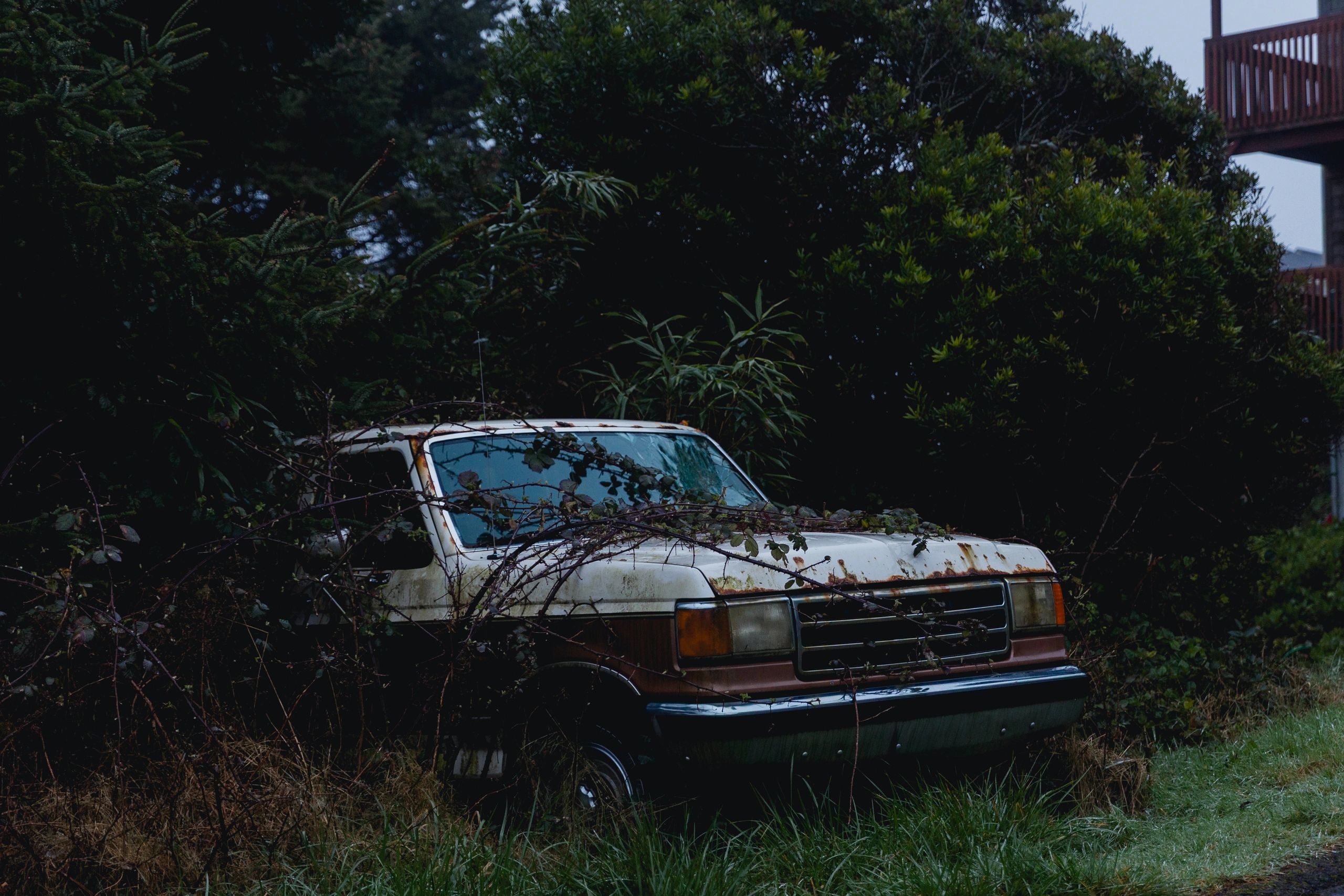 Older damaged truck representing vehicles in rough condition